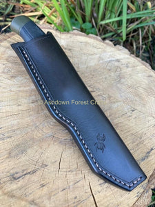 Front view of the Mora Companion sheath with the knife in situ, showing the hand stitching and Ashdown Forest Crafts stag beetle logo