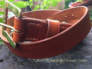 Hand sewn leather belt with a brass buckle