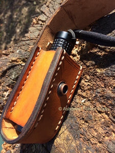 A hand-made leather belt pouch to fit the Olight S2 or S2R Baton torch.